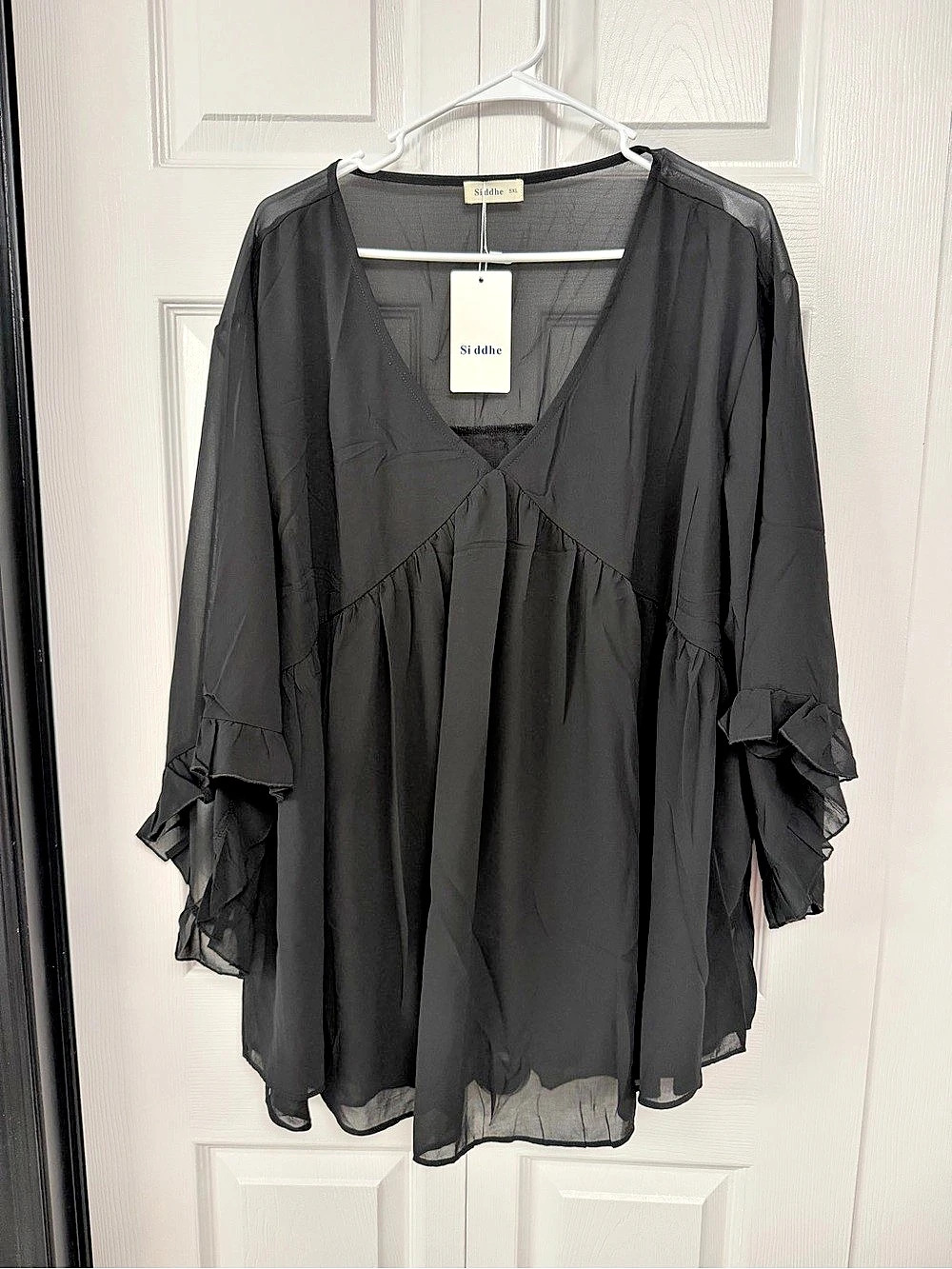 Women’s Si ddhe Chiffon Ruffle Sleeve Blouse in Black.